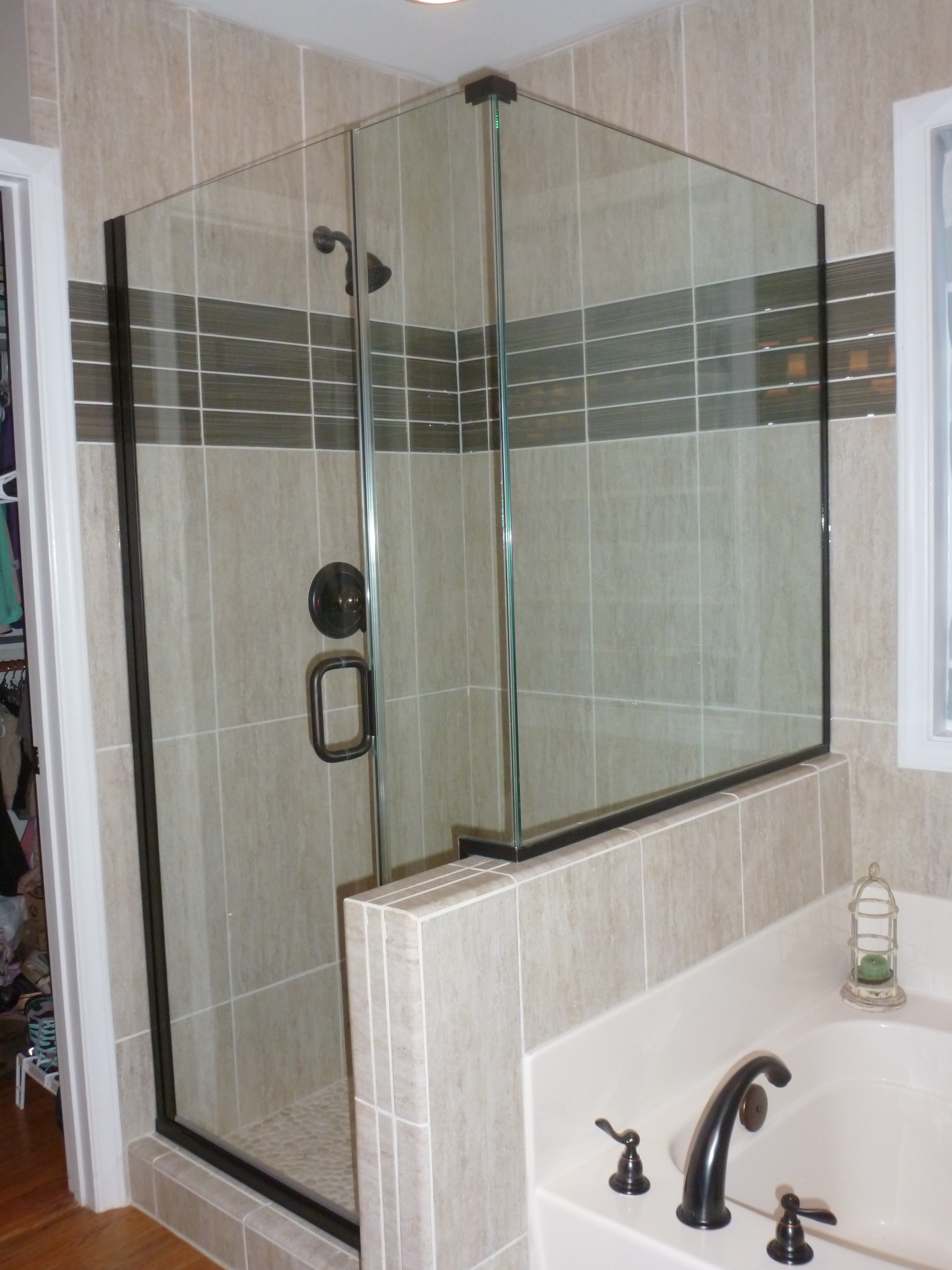 Before And After Large Shower With Class Doors And Ceramic Tile
